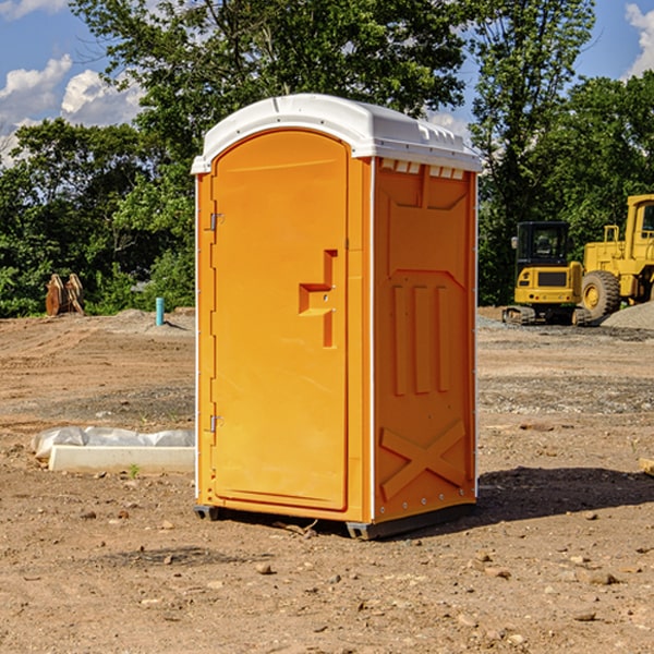 how often are the portable toilets cleaned and serviced during a rental period in Konawa